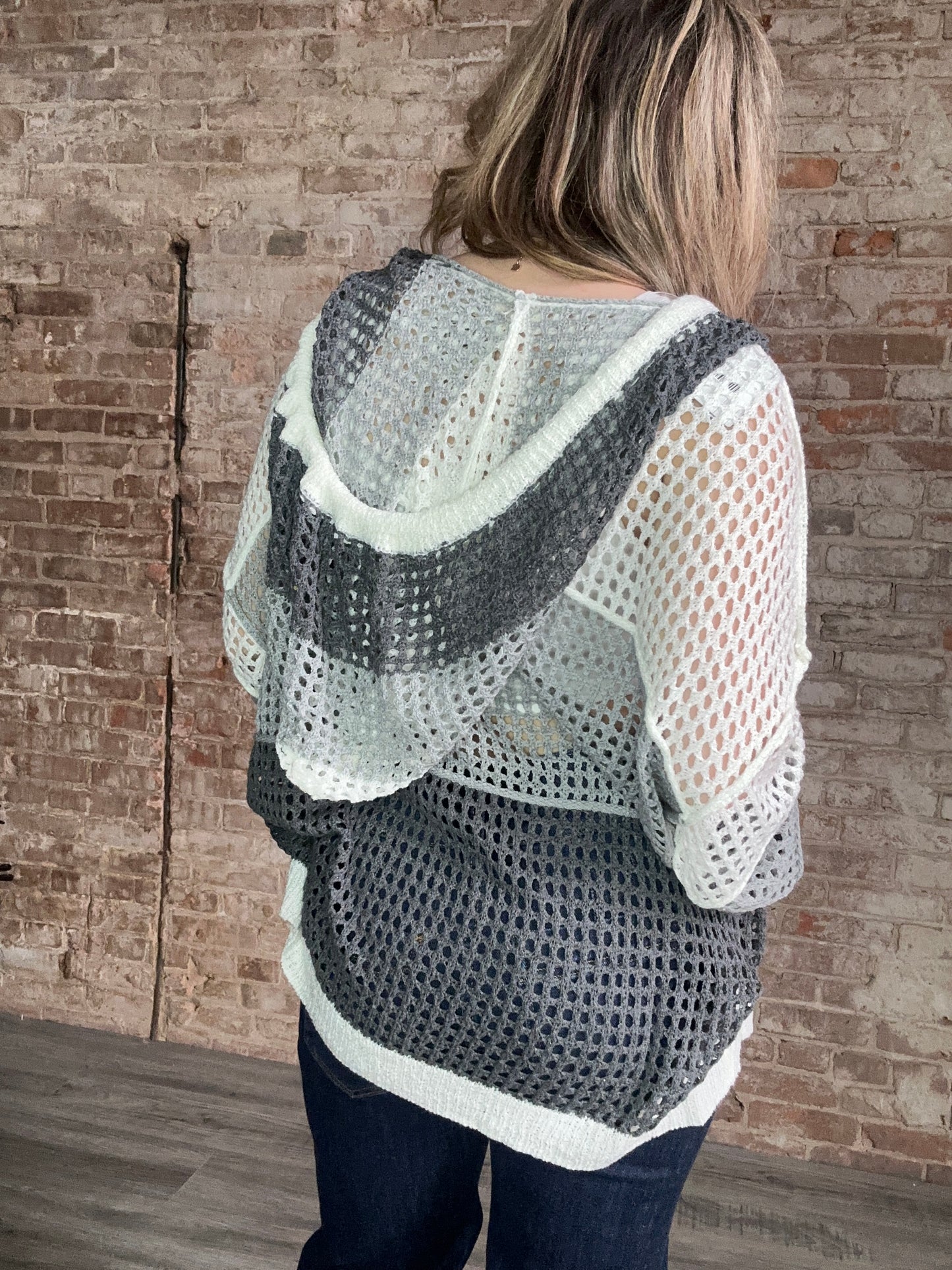 Contrasting Color Match Oversized Knit with Hood