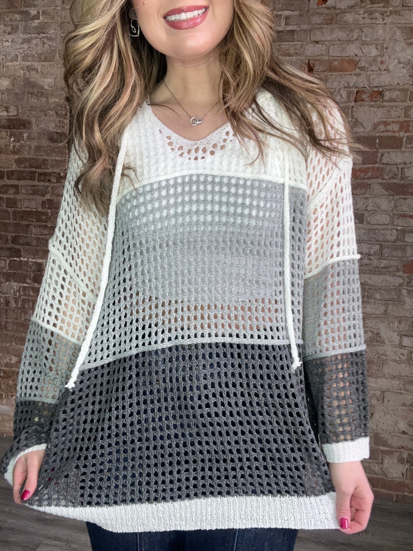 Contrasting Color Match Oversized Knit with Hood