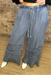 Frayed Denim Pants with Ruffled Hem